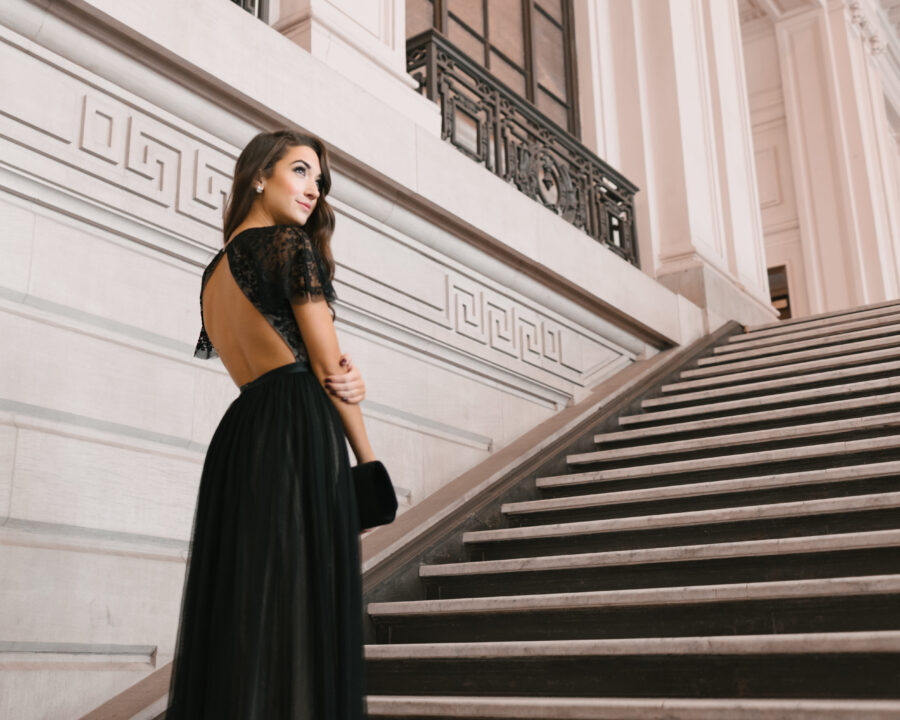 wearing a black dress to a wedding