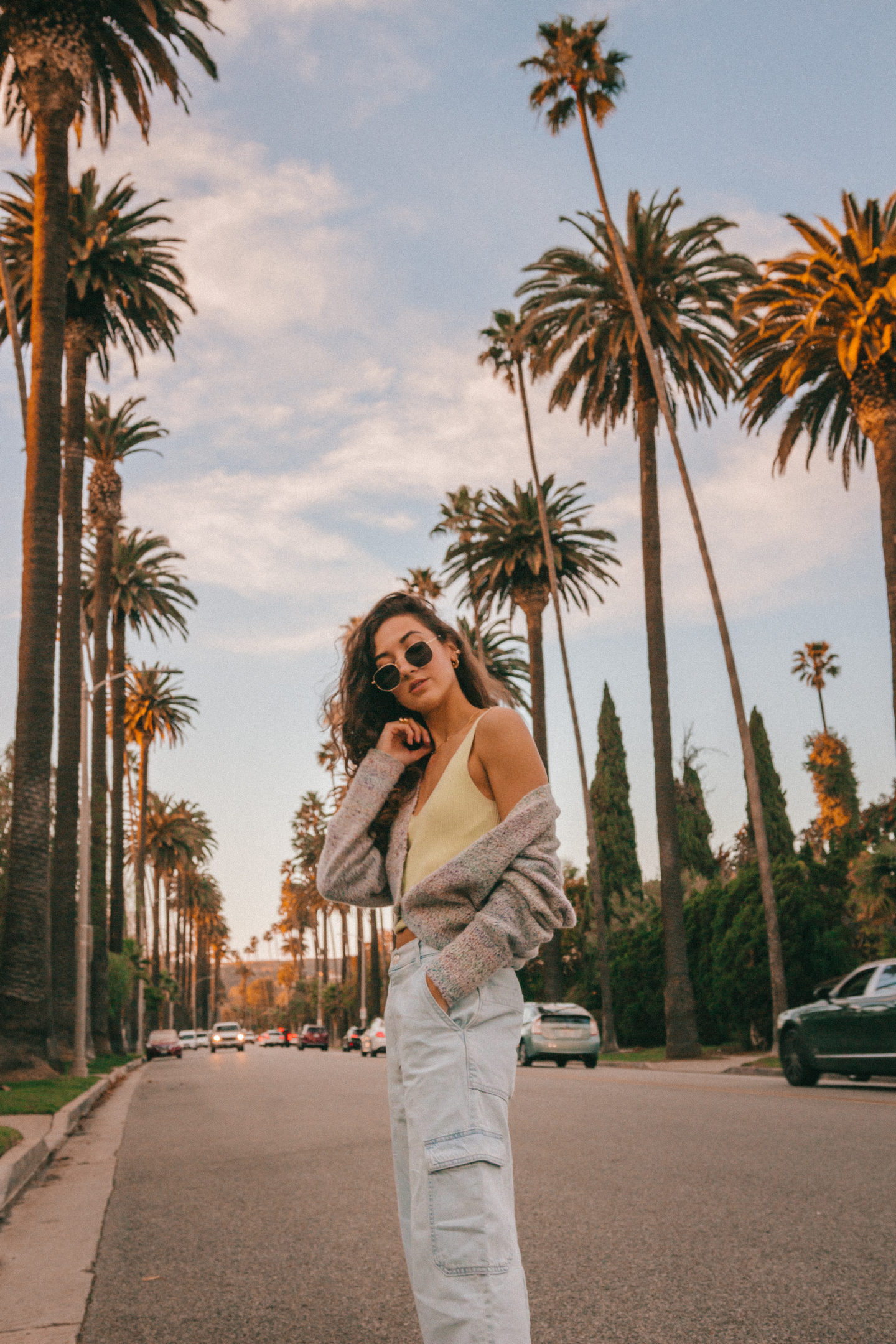 LA Outfit Recap - Knit womens fashion palm trees beverly hills california casual style curly hair inspo jeans